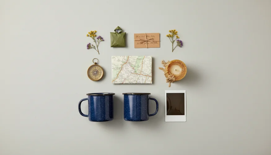 Flat-lay of adventure keepsakes symbolizing shared experiences that build deep relationships